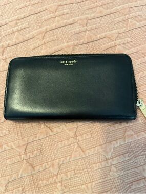 kate spade Black Zip-Around Leather Wallet with Gold Logo